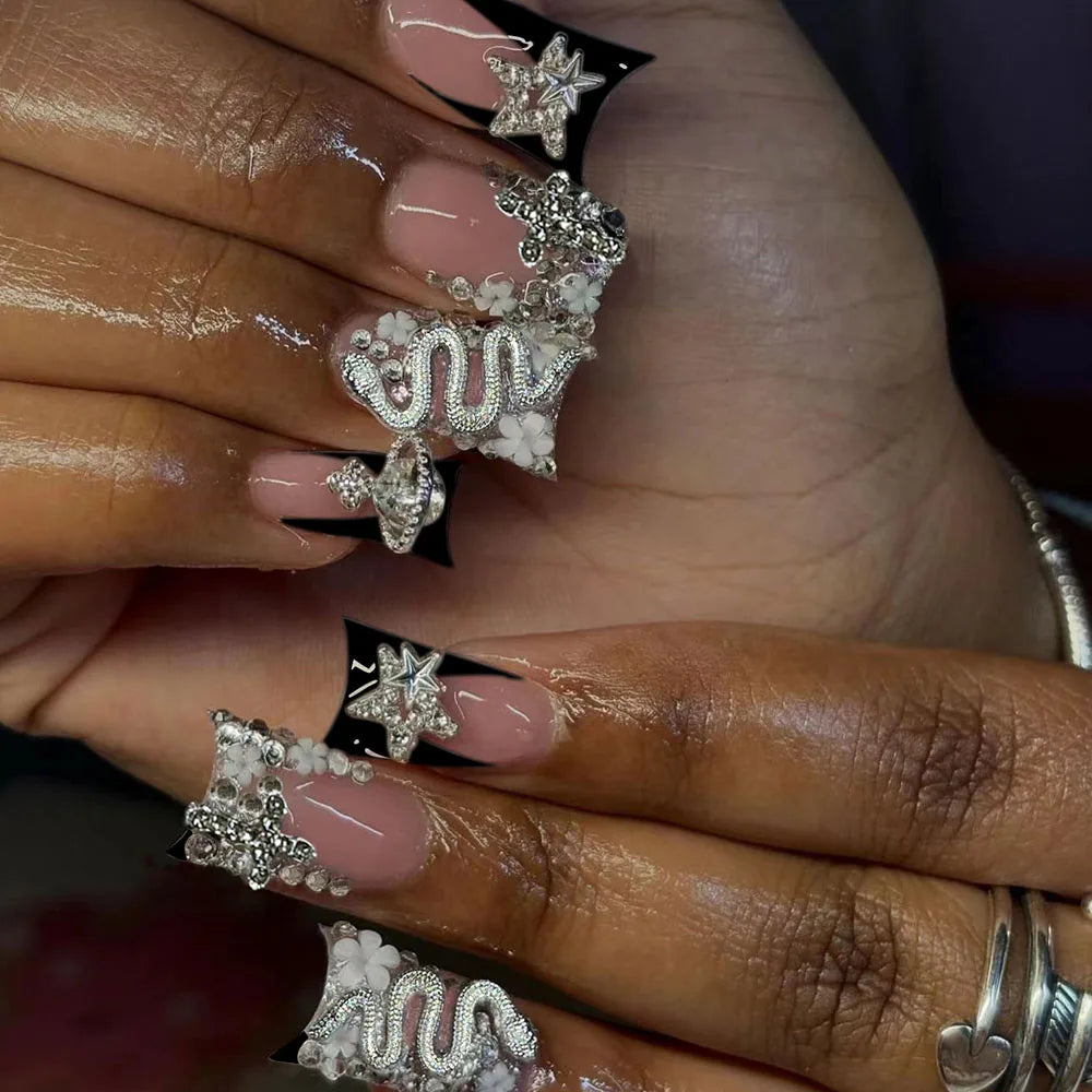 Duck Nail French Tips with Cross, Snake & Rhinestone Design.