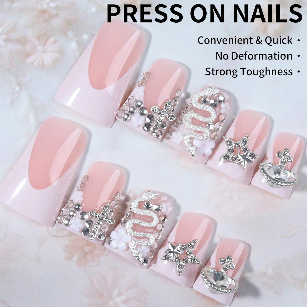 Duck Nail French Tips with Cross, Snake & Rhinestone Design.