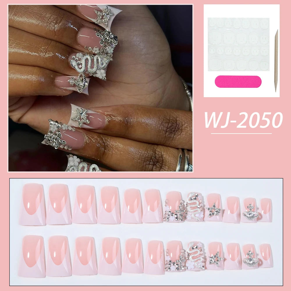 Duck Nail French Tips with Cross, Snake & Rhinestone Design.