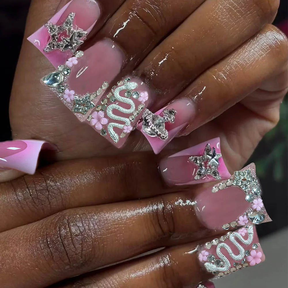 Duck Nail French Tips with Cross, Snake & Rhinestone Design.
