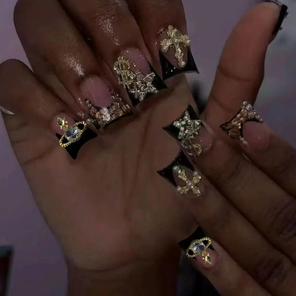 Duck Nail French Tips with Cross, Snake & Rhinestone Design.