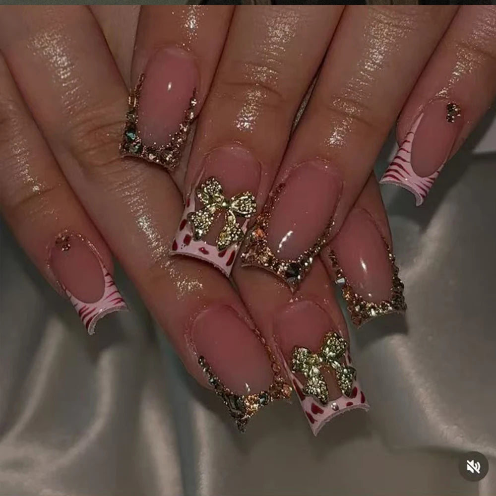 Duck Nail French Tips with Cross, Snake & Rhinestone Design.